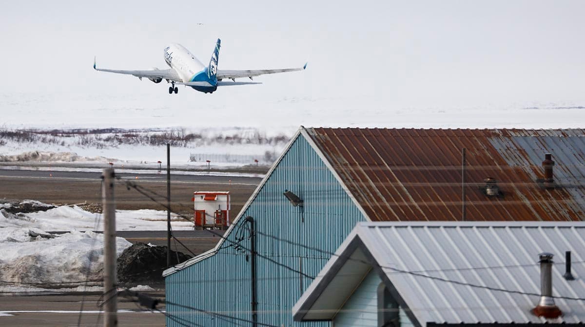 Alaska Air Cargo plane takes off from Nome, Alaska.