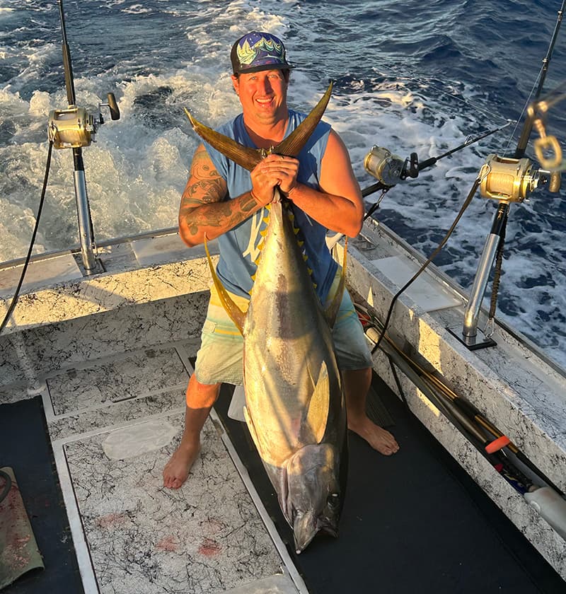 Josh Schade with fish on boat