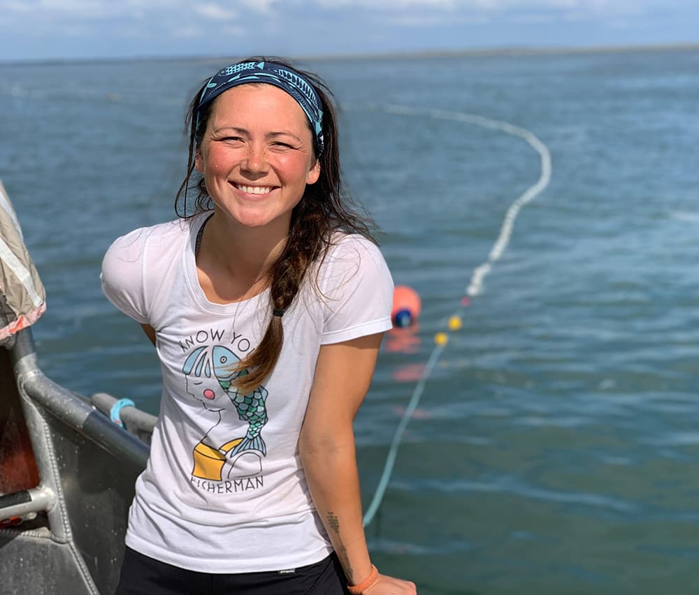 Casey Coupchiak on her boat
