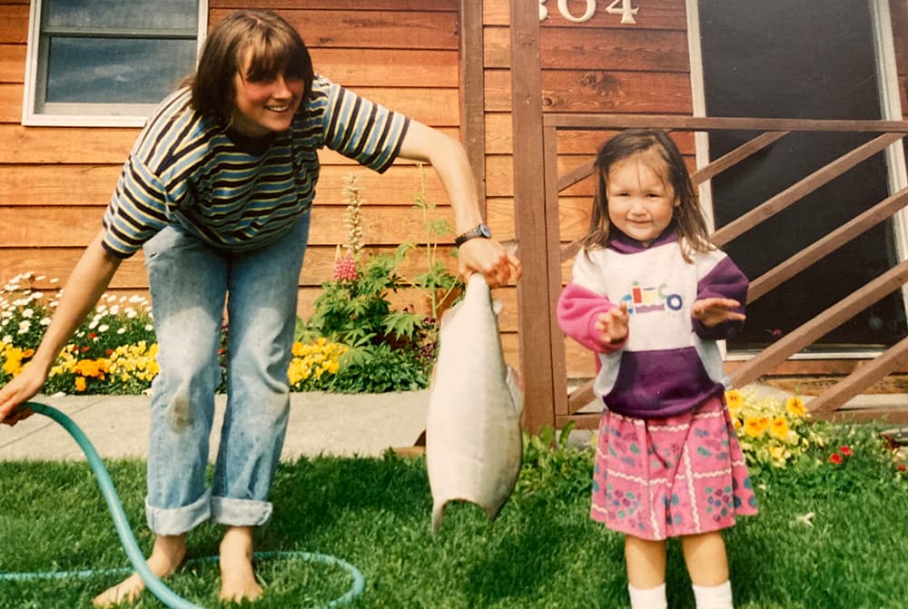 Girl with mom and fish